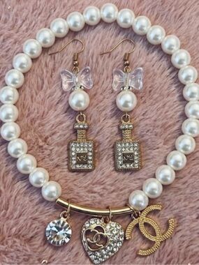 Gold dangle drop earrings and bracelet set brand new